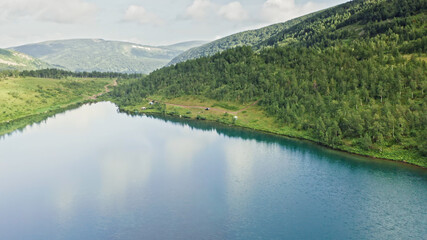 Beautiful high mountain lakes, Glacier over a mountain lake, Drone, Aerial view, Ivanovskie lakes, Khakassia, Russia