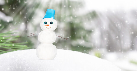 Snowman in the winter forest. New Year card.