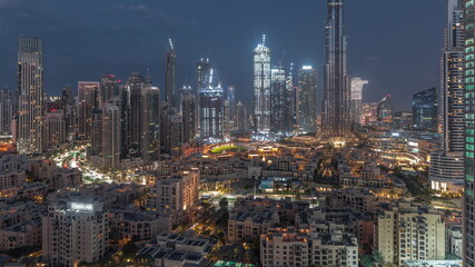 Dubai Downtown night to day timelapse with tallest skyscraper and other towers