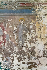 frescoes on the walls of an abandoned temple