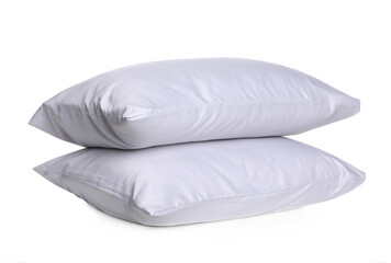 Fototapeta na wymiar New soft bed pillows on white background. Silky linens