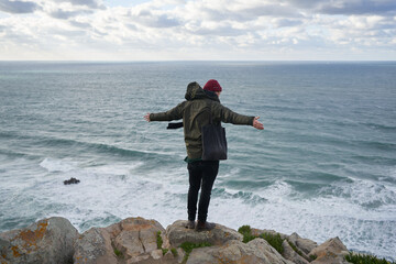 person watching the ocean