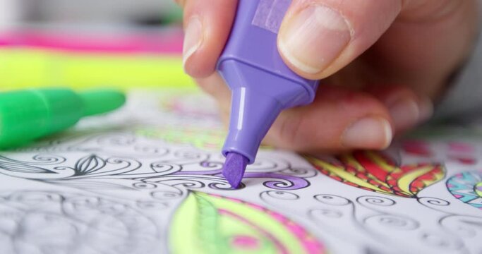 Close-up coloring book for adults. Drawing as a hobby. Concentration activities to relieve stress.