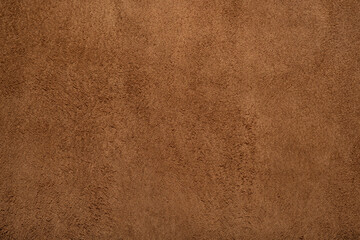 Brown suede leather texture background, genuine leather, top view.