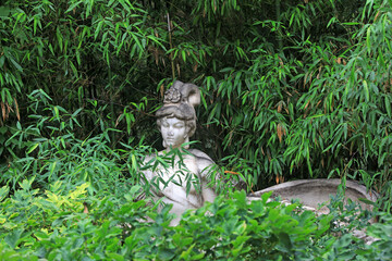 Beautiful lady sculpture in peony flowers, Beijing Botanical Garden