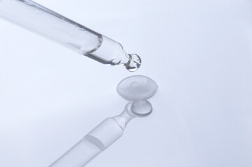 A drop of cosmetic oil and a dropper