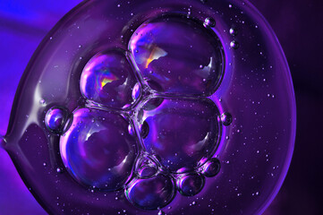 abstract background. oil drops on water. macro.