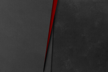 Black and red rectangular mockups on a dark concrete background. Design elements or portfolio. Copy space