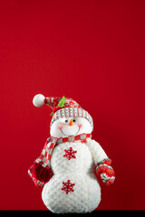 snowman isolated on red background for noel or Christmas