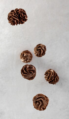 Soaring coffee marshmallow, food for levitation, sweet dessert on light background