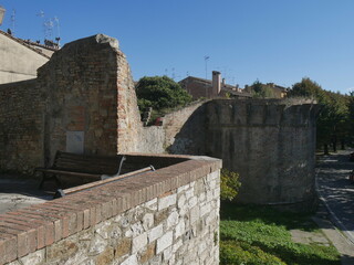 walls with towers and bulwarks that surround the old town of San Gimignano