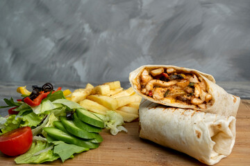 Chicken wrap - tortilla bread, served with fries