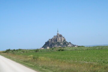 Mont saint michel architecture panoramic beautiful postcard view at Dusk in Summer Low Tide, France