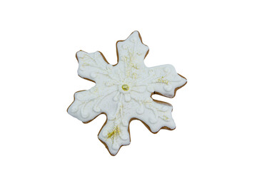 Christmas gingerbread cookie made in shape of snowflake isolated on white background