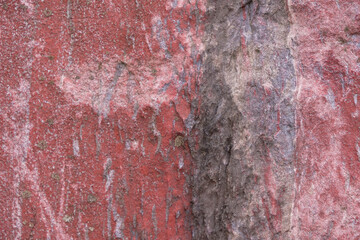 Red stone background. Decorative effect. Partial blurring. 