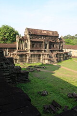 The ancient temple complex of Angkor Wat is buried in the jungle.