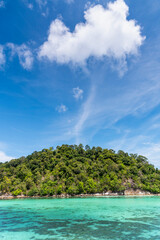 Fototapeta na wymiar Beautiful Andaman sea, Tropical Turquoise clear blue sea and blue sky background at Lipe Island, Satun, Thailand - summer vacation travel