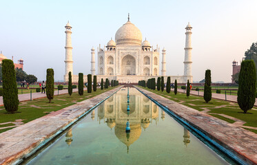 Taj Mahal at sunrise UNESCO World Heritage Site Agra Uttar Pradesh India Asia. Crown of the Palace is an ivory-white marble mausoleum