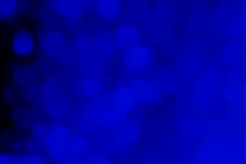 Beautiful abstract blue background with festive bokeh