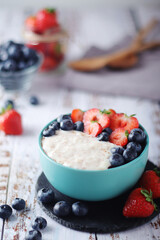 Milk rice with berries ready for breakfast