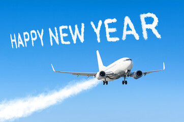 Drawing by airplane vapor steam contrail in blue sky. Happy New year concept.