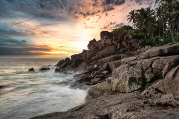 A freedom sunset scene in Sri Lanka west coast close Unawatuna.  clouds and surf. Beruwala,...
