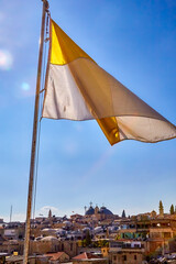 view and Yellow/White Half Flag on roof the Austrian Hospice of Holy Family, a refuge for itinerant pilgrims, was opened in 1854 by Catholic Church of Austria in Holy Land. Jerusalem, Israel