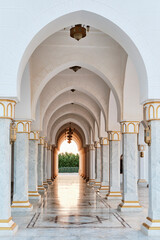 View of outer courtyard of Big Mosque in Sharm El Sheikh, Egypt. Arches and columns in white marble