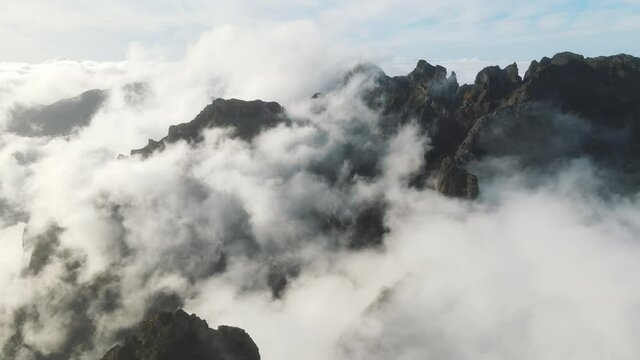 Aerial footage over the highest mountains on Madeira island. Pico do Arieiro and Pico Ruivo are very popular peaks to visit. Hikers paradise known as PR 1 trail Vereda do Areeiro. 4k footage