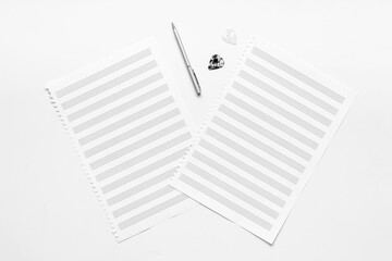 Empty music sheets for writing notes, top view. Compose music concept