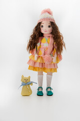 Girl with a doll, Yellow Dress, A girl in a yellow dress and a cat, child's play.