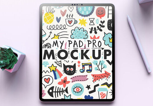 My Pad Pro Tablet Mockup on a Clean White Desk and a Succulent Flower on a Over the Head View