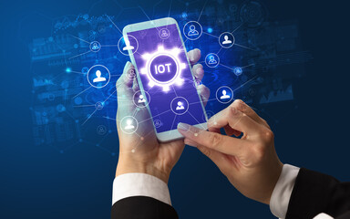 Hand using smartphone with technology concept