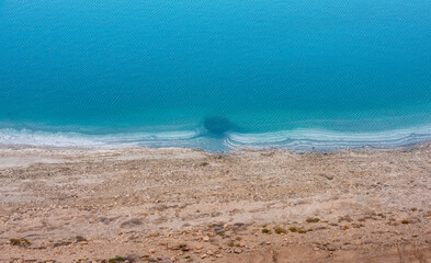 Fototapeta na wymiar A view from above at a sinkhole inside the water in the dead sea.