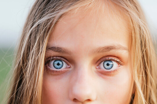 Blond girl with blue eyes