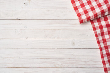 Red checkered tablecloth wooden background texture kitchen decoration - Powered by Adobe