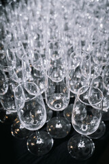 rows of clean glasses on the table