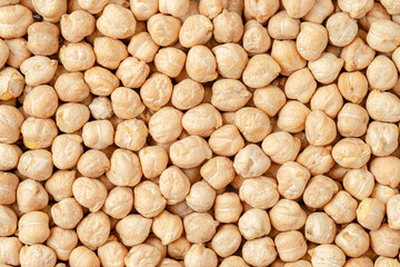 Dry chic peas closeup background. Top view, overhead