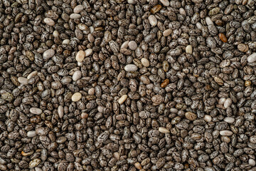 Macro shot of black chia seed background or texture. Directly above