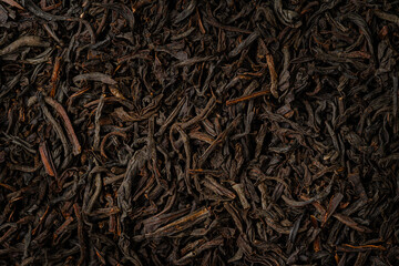 Close up of dry black tea background. Top view