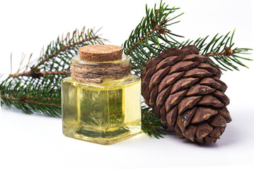 glass bottle with cedar oil, cedar essential oil.