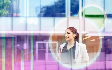 Smiling businesswoman with laptop in circular icon