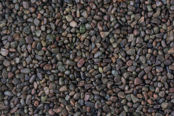 decorative pebbles, dark blue color stones background texture, wallpaper abstract