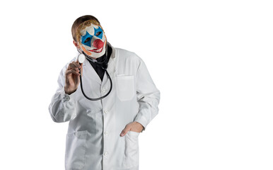 Not an honest doctor in a clown mask on a white isolated background. Hand gesture with medical...