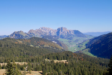 Panoramic view of Alpstein massif seen from the high plateau Hintere Hoehi, St. Gallen, Switzerland.