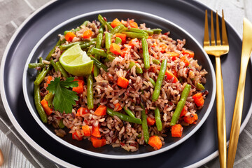 fried brown rice with green beans and carrot