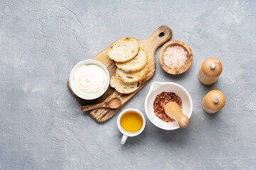 Fried toast made of fresh bread with sauce and olive oil. Alternative handmade food cooking concept. Top view, copy space