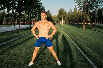 sporty man workout in park crossfit exercise summer