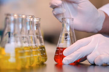 Indicator solution added to Erlenmeyer flask.