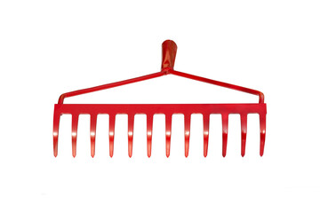 New red rake isolated on white background.